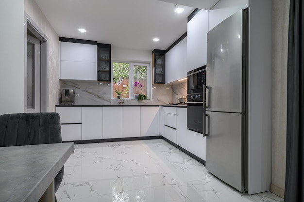 A recently renovated kitchen with sleek modern appliances