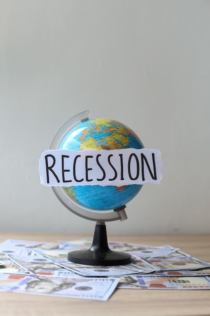 Recession words on world globe. Global financial concept.