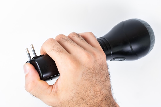 Rechargeable flashlight on a white background