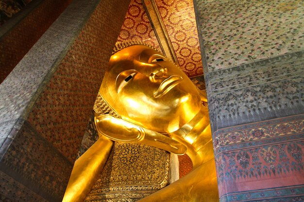 Reclining Buddha gold statue 