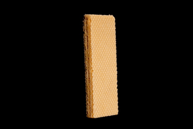 Rectangular waffle isolated on black background. High quality photo