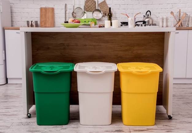 Recycle bins in the kitchen. Household waste sorting.