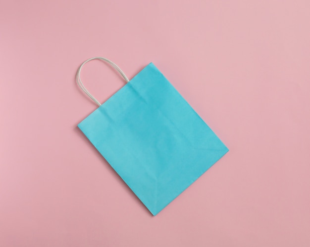 Recycle paper bag isolated on pink  Mockup for design