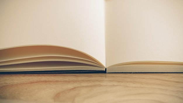 Recycled paper book on wooden background