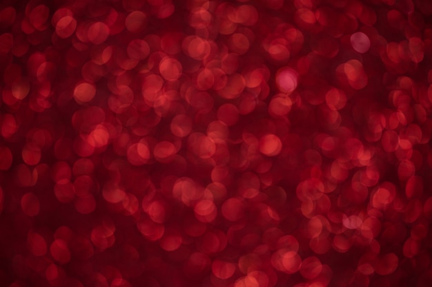 Red abstract bokeh background. Red Christmas texture.