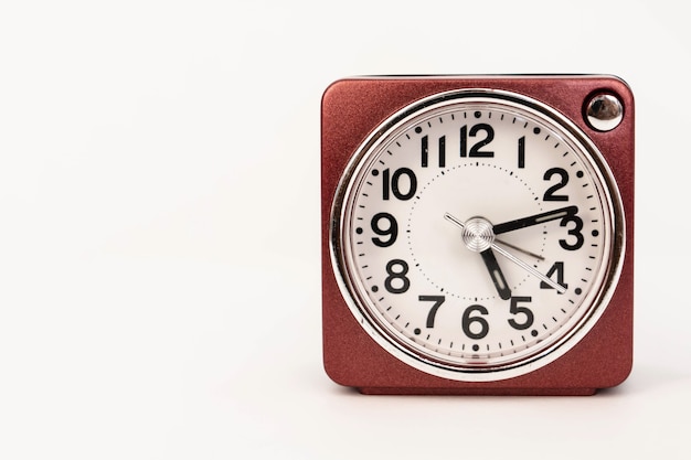 A red alarm clock isolated