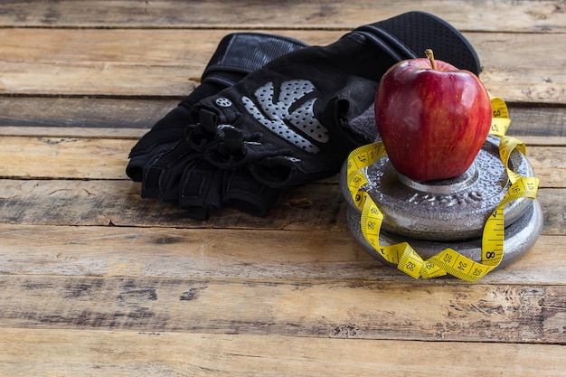 Red apple and dumbbells