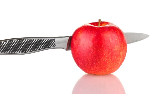 Red apple and knife isolated on white