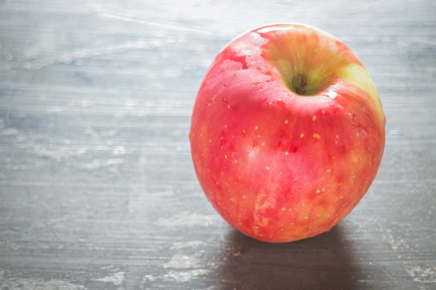 Red apple on the table