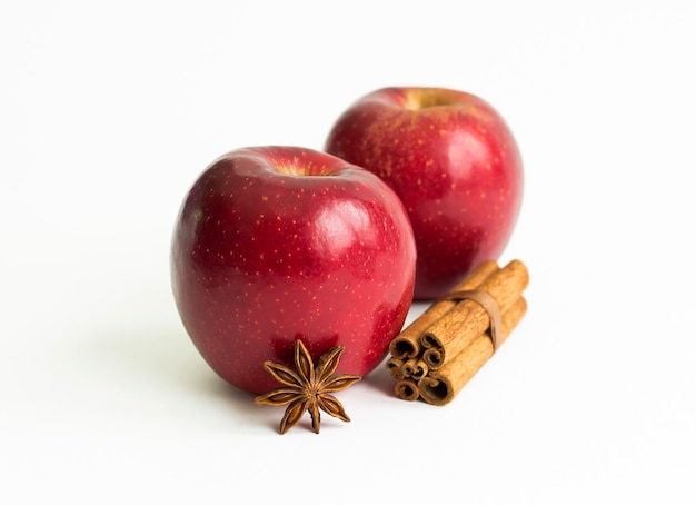 Red apples, cinnamon and star anise.