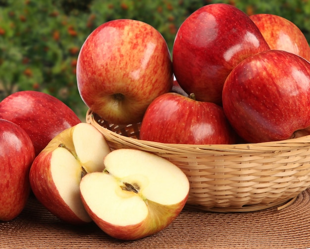 red apples over a wooden surface. Fresh fruits