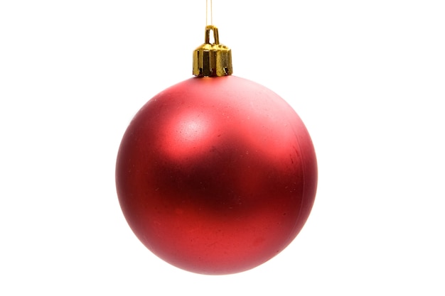 Red ball of christmas on a over white background