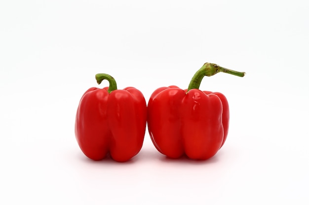 Red bell peppers on a white background