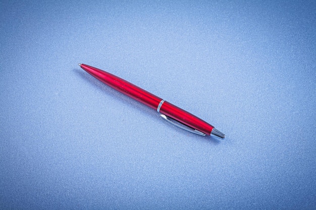 Red biro pen horizontal view office concept