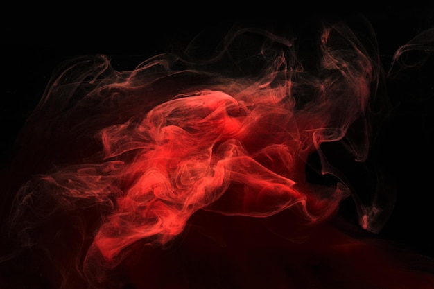 Red black ink abstract background Acrylic paint backdrop for perfume hookah cosmetics Mysterious smoke clouds colorful fog