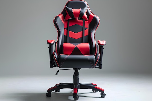 A red and black office chair sitting on top of a desk