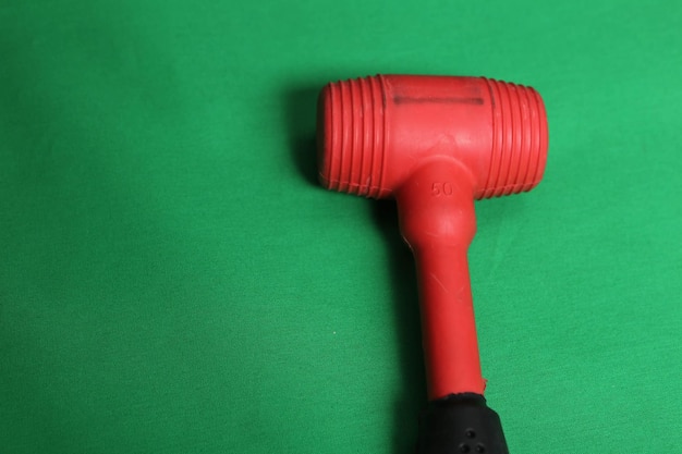 red and black rubber hammer