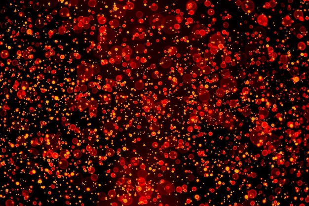 Red bokeh abstract background gold and black glitter lights