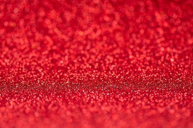 Red bokeh background. Red defocused lights background for design Valentine's Day greeting card