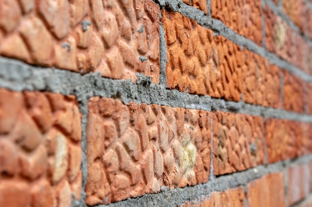 Red brick wall texture  close up soft focus background