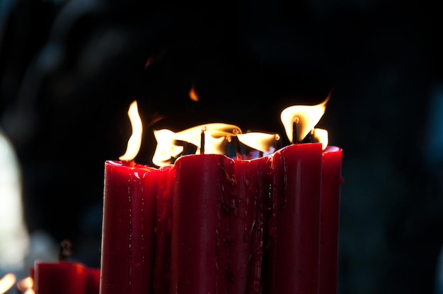 Red bright candles lighten up