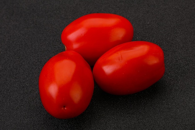 Red bright tasty tomato heap