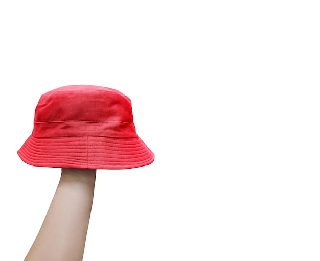 red bucket hat on mans hand