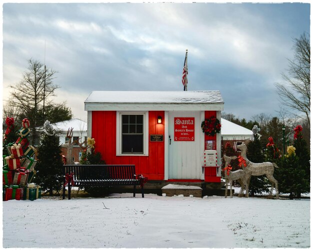 a red building with a sign that says quot no parking quot on it