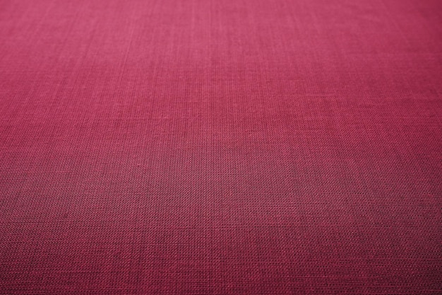 Red burgundy background fabric texture A piece of woolen cloth is neatly laid out on the surface