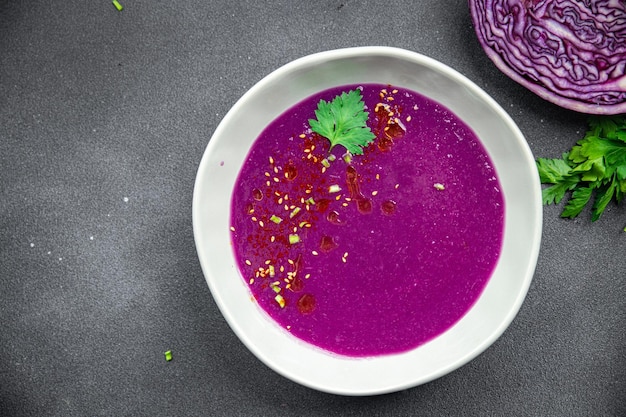 red cabbage cream soup purple meal food snack on the table copy space food background rustic