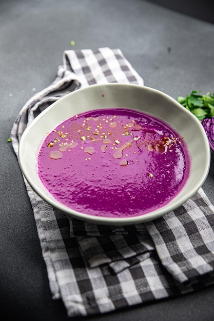 red cabbage cream soup purple meal food snack on the table copy space food background rustic