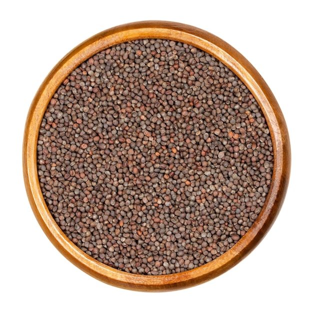 Red cabbage seeds in wooden bowl