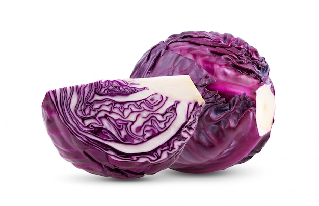 Red cabbage slice on white wall.