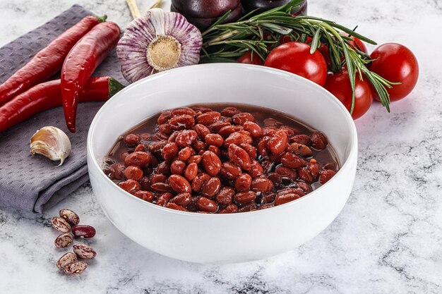 Photo red canned beans in the bowl