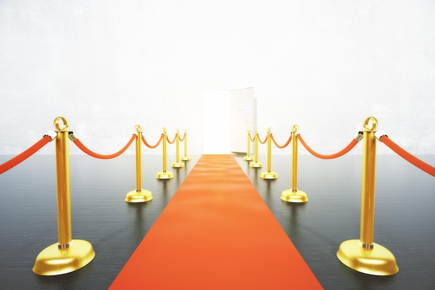 Red carpet leading to open door concept