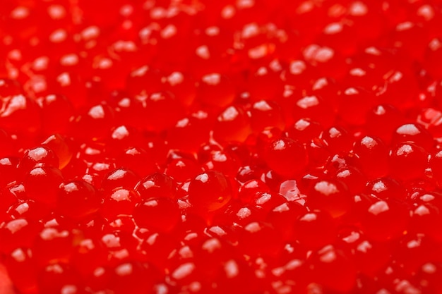 Red caviar as background closeup