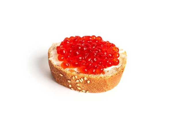 Red caviar isolated on a white background Sandwiches with red caviar High quality photo