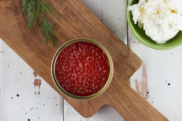 Red caviar on a wooden table bruschetta with caviar