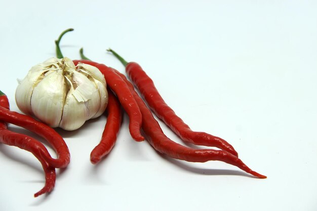 Red chili pepper and Garlic on white background