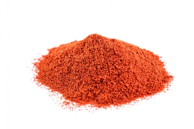 Red chili powder isolated on white