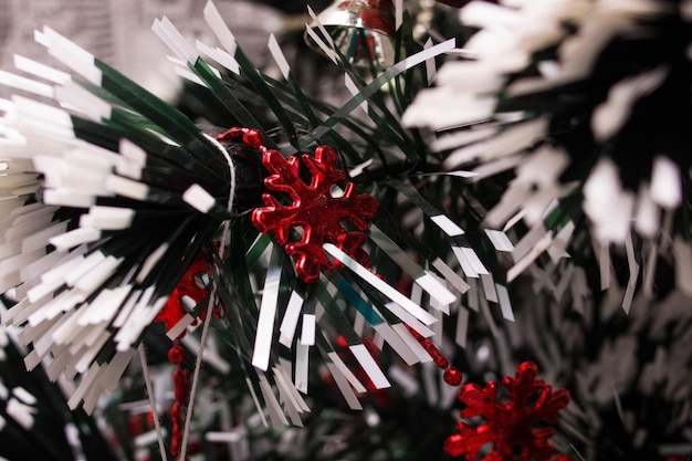 Red christmas decoration on a spruce branch