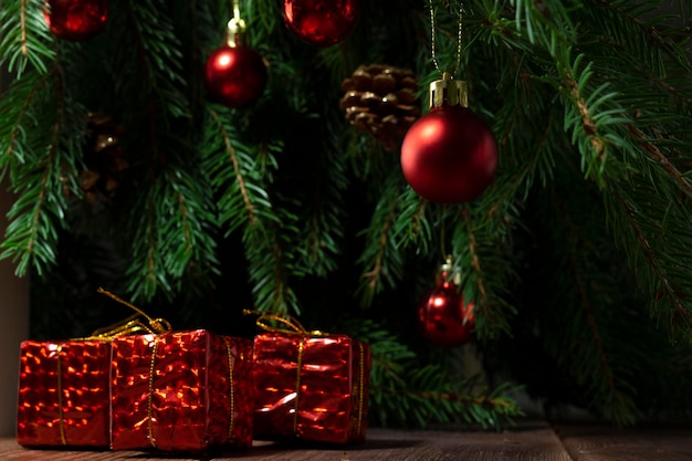 Red Christmas gifts on the background of the Christmas tree Christmas composition