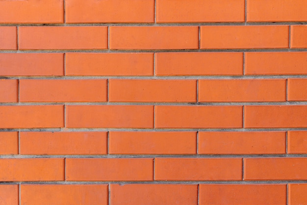 Red color brick wall for brickwork background design