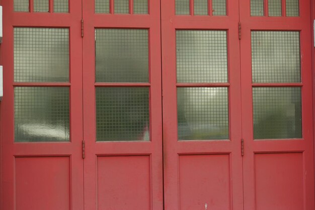 Red color wood old door in singapore