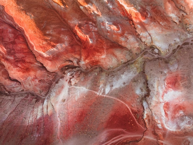 Red colorful mountains in Altai Siberia Russia Aerial top down view KyzylChin valley