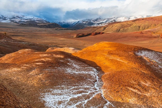 Red colorful mountains in KyzylChin valley in Altai Siberia Russia