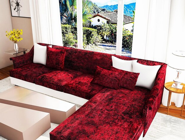 A red couch with white pillows and a white rug with a mountain in the background.