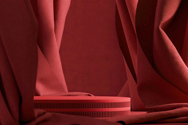 Red cylindrical platform on red velvet curtain background