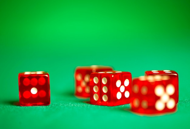 red dices on green cloth...