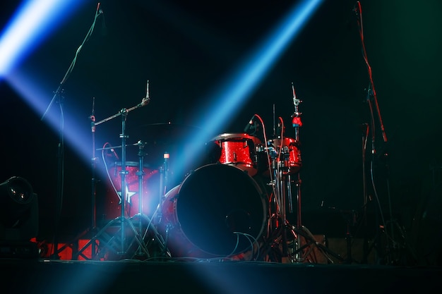 Red drum set ready for concert on stage